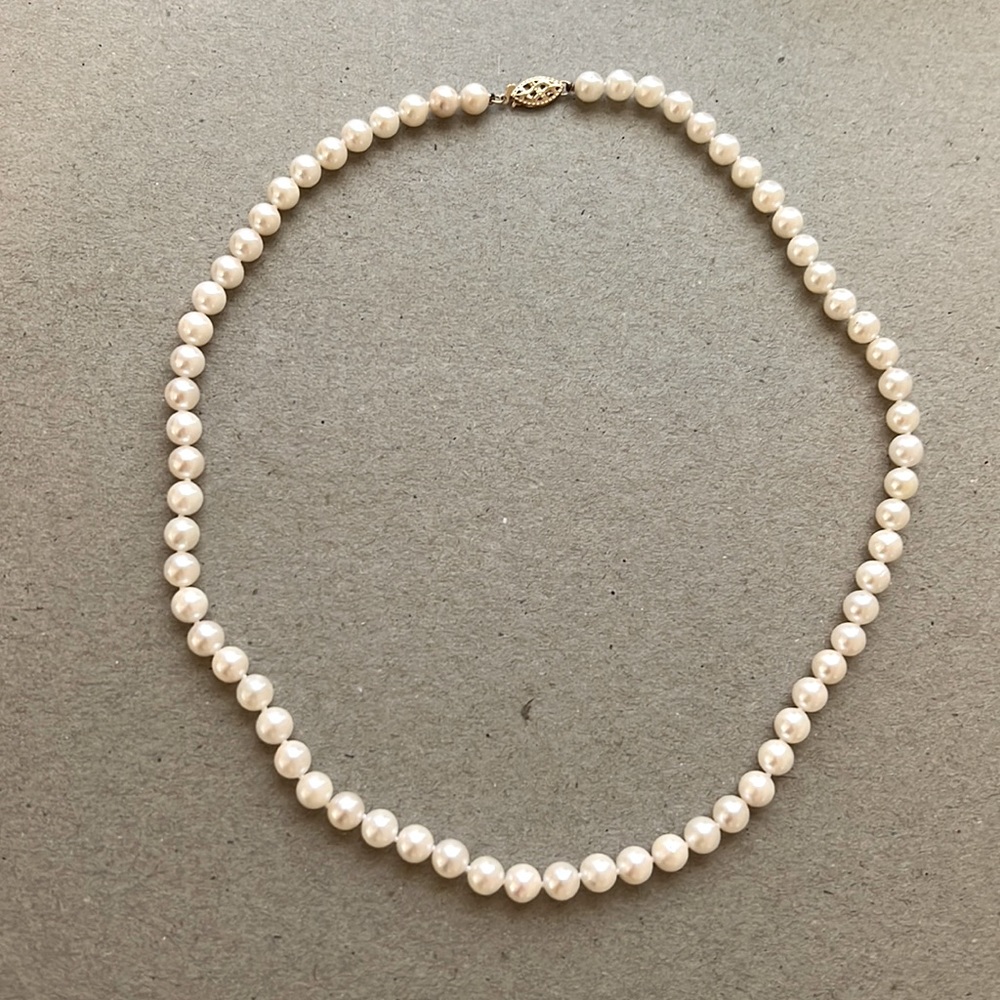 Real pearls, gold clasp, 18”